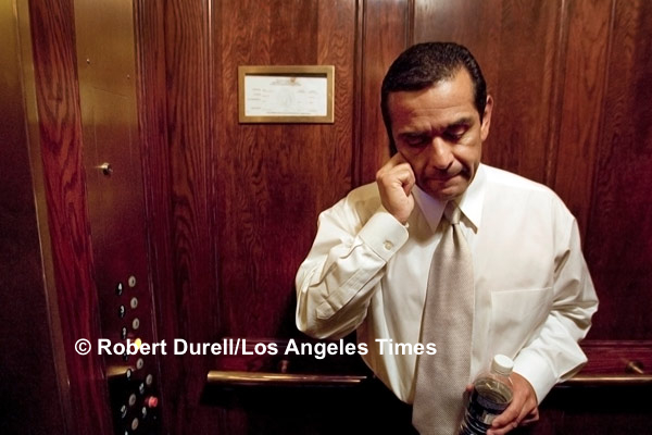 THE MAYOR ---
Former Speaker of the Assembly Antonio Villaraigosa, now mayor of Los Angeles, was in town to push a new agenda: he wanted more control over the LA School District. I shadowed him for three days, hoping to capture more than the run-of-the-mill speeches. While outwardly confident he could get the bill, privately he seemed unsure. Even though he was surrounded by aides and friends, I managed to slip into an elevator as he took a call to capture a more pensive moment. 
June 19, 2006
