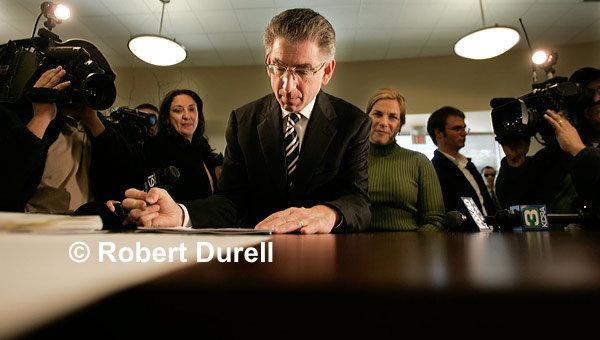 UNDERDOG --- What does it feel like to stand on the other side, to be the clerk who has to deal with the filing papers - and the press corps - as gubernatorial candidate Phil Angelides delivers his paperwork. I wanted to put myself in the position of that clerk. This view enhances the reality of the moment. You are the clerk. You can see the candidate, the candidate's wife and the media. It is a view the public rarely gets to experience.
February 14, 2006