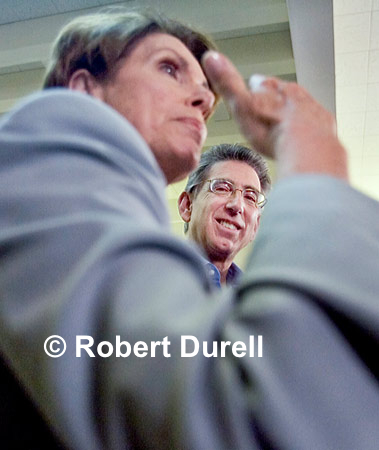 THE SPEAKER --- Political photography is a lot about depicting relationships. Who is the person in power, who is the second-most powerful and so on. Here, there was no question. Nancy Pelosi was pretty much assured of re-election and of becoming Speaker of the House and I wanted to make her status clear in my photograph. She was stumping for candidate Phil Angelides and her appearance at a phone bank was a boost for the underdog candidate.
October 18, 2006.
