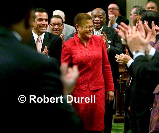 LADY IN RED ---
The best politicians know how to seize the moment, how to leave an indelible mark. Karen Bass put her unique stamp on an historic event, when she became not only the newest Speaker of the Assembly, but the first African-American woman to hold the office. She didn't need a spotlight as she strode on to the Assembly floor, eschewing the dark suits favored by her predecessors.
May 13, 2008.
