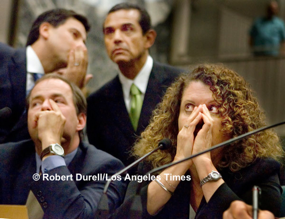 THE VOTE  --- Reputation and future potential can rise and fall in a single vote. Even when they don't it can feel that way to opposing parties. As the votes were counted for Villaraigosa's bill, I pushed my camera close to two LAUSD officials, who opposed the bill, with Villaraigosa, top right, and Speaker Fabian Núñez, top left, who were pushing for its passage in the background. All of them were so intent on listening to the one-by-one voice vote, no one even noticed I was even there. The bill passed that day only to be largely overturned later by a judge.
August 29, 2006
